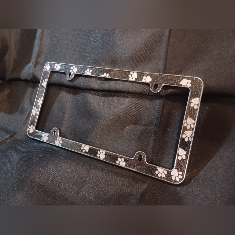 Paw Print License Plate Frame. Black Sparkle.